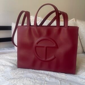 Dark red medium telfar. Fantastic condition!